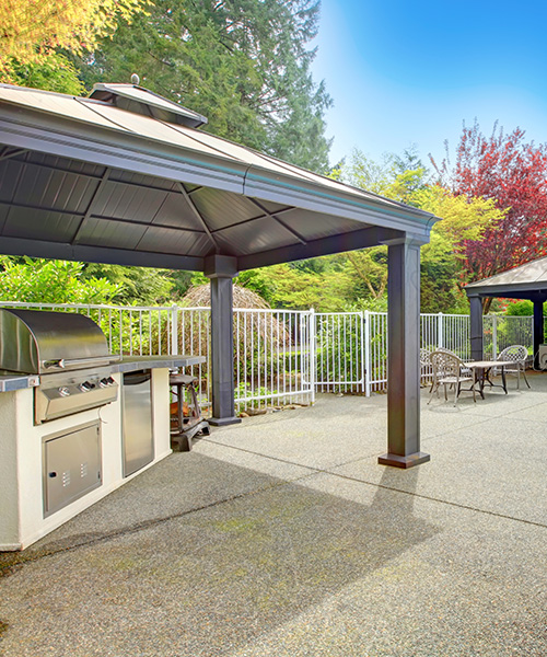 residential property backpatio with paved concrete and outdoor kitchen cincinnati oh